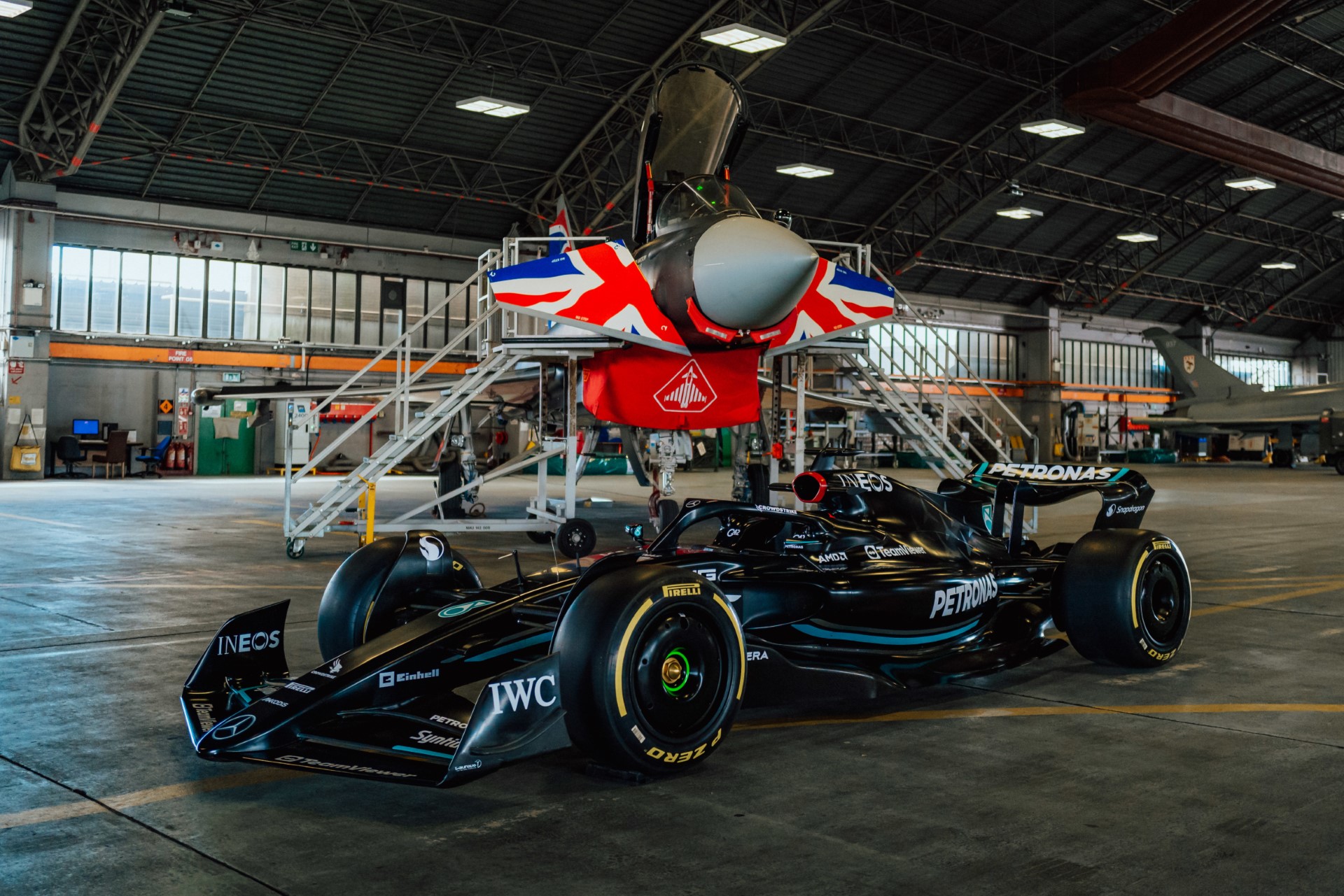 F1 Car pictured in front of RAF Typhoon